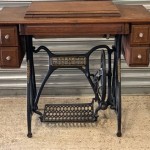 Antique Sewing Machine In Table